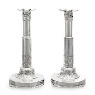 * A Pair of Russian Silver Candlesticks, Maker's Mark Obscured, 1835, each raised on a circular base bearing a monogram and c