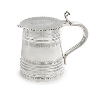 * A Russian Silver Tankard, Likely Mark of I.P. Prokofiev, Moscow, Late 19th/Early 20th Century, the lid centered by a vacant