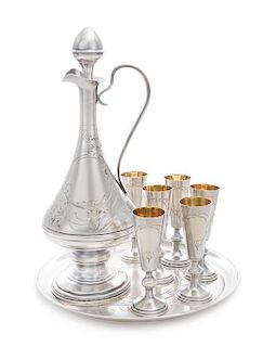 * A Russian Silver Liquor Service, Mark of Ivan Khlebnikov, Moscow, Early 20th Century, comprising a ewer, underplate and six