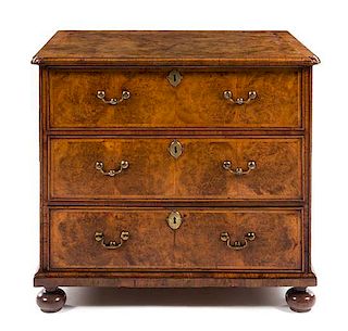 A William and Mary Inlaid Burr Walnut Chest of Drawers Height 29 1/2 x width 32 x depth 22 1/2 inches.