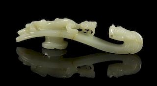 A Carved Jade Belthook, Width 5 3/8 inches.