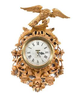 An Early George III Giltwood Cartel Clock Height 32 x width 18 inches.