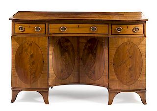 A George III Mahogany Dressing Cabinet Height 32 x width 52 1/4 x depth 23 1/4 inches.