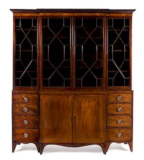 A George III Mahogany Breakfront Bookcase Height 85 3/4 x width 72 1/4 x depth 15 1/4 inches.