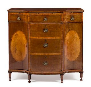 A George III Mahogany and Satinwood Inlaid Breakfront Commode Height 38 x width 41 x depth 22 1/2 inches.