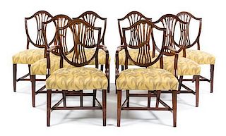 A Set of Eight George III Mahogany Dining Chairs Height 37 inches.
