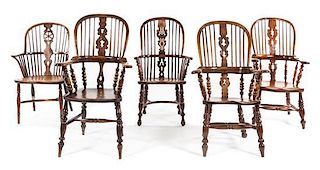 An Assembled Set of Five Elm and Yew Windsor Chairs Height 42 inches.