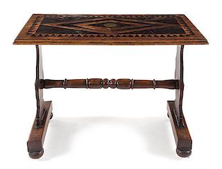 An English Parquetry Shipwreck Table Height 29 1/2 x width 43 x depth 22 1/2 inches.