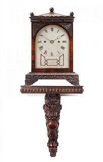 A Regency Rosewood Bracket Clock Height overall 26 1/4 inches.