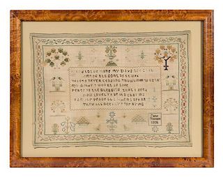 An English Needlepoint Sampler Frame: 17 3/8 x 21 3/4 inches.