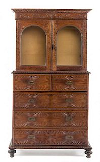An Anglo-Indian Rosewood Cabinet Height 77 3/4 x width 42 x depth 17 1/2 inches.