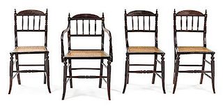 * A Set of Four Victorian Turned Oak Game Chairs Height 32 1/2 inches.