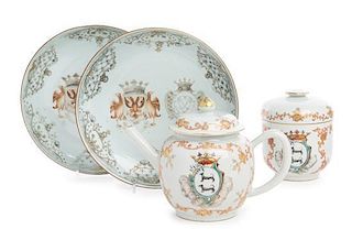 A Pair of Chinese Export Armorial Dishes, a Teapot and Sugar Basin Diameter of dish 8 7/8 inches.