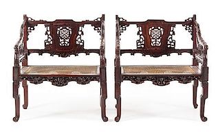 A Pair of Chinese Carved Armchairs Height 36 x width 30 1/2 x depth 18 3/4 inches.