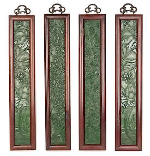 A Set of Four Chinese Jade Plaques Height 24 1/4 x width 3 1/2 inches.