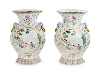 A Pair of Chinese Export Famille Rose Porcelain Vases Height 14 1/8 inches.