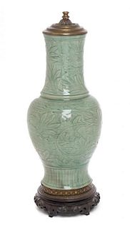 A Chinese Celadon Porcelain Vase Height 20 3/8 inches.