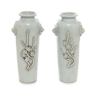A Pair of Chinese White Glazed Porcelain Vases Height 10 1/4 inches.