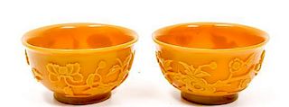 A Pair of Peking Glass Bowls Height 2 1/2 x diameter 4 1/2 inches.