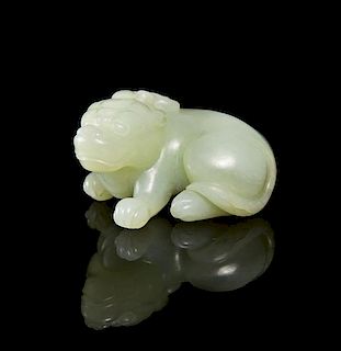 A Carved Jade Figure of a Bixie, Width 2 5/8 inches.