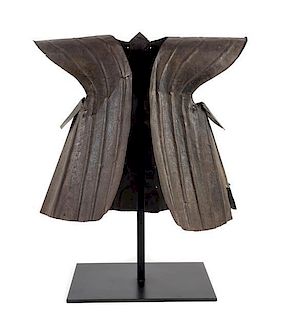 An Indonesian Metal Armor Vest Height of armor 31 inches.