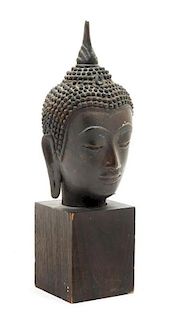 * A Cambodian Bronze Head of Buddha Height 6 inches.
