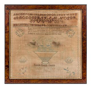 An American Needlepoint Sampler Frame: 19 1/2 x 20 1/4 inches.