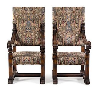 A Pair of Oak Renaissance Revival Open Arm Chairs Height 55 1/4 x width 26 1/2 x depth 28 1/2 inches.