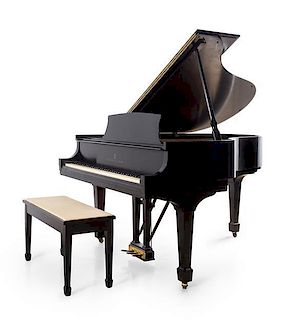 * A Steinway & Sons Baby Grand Piano Length of case 66 inches.