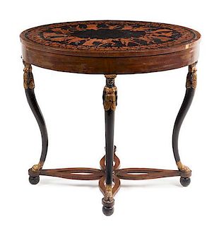 An American Parcel Gilt and Ebonized Walnut Table Height 31 1/2 inches.
