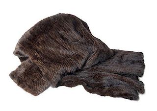 A Knitted Mink Throw 5 feet 8 inches x 4 feet 1 inch.