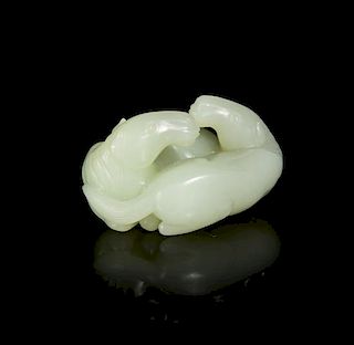 A Celadon Jade Carving of Two Horses, Width 2 3/8 inches.