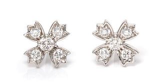 * A Pair of Platinum and Diamond Floret Snowflake Earrings, 1.90 dwts.