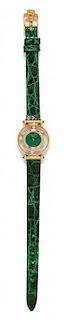 An 18 Karat Yellow Gold, Diamond and Green Onyx 'Happy Diamonds' Wristwatch, Chopard,