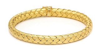 An 18 Karat Yellow Gold and Sapphire Basket Weave Bangle Bracelet, Roberto Coin, 15.80 dwts.