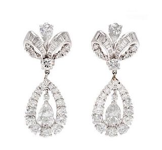 * A Pair of Platinum and Diamond Pendant Earrings, 26.70 dwts.
