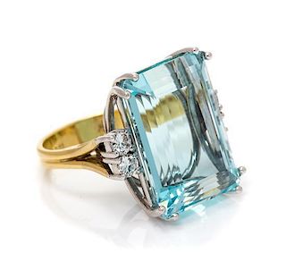 An 18 Karat Bicolor Gold, Aquamarine and Diamond Ring, 9.20 dwts.