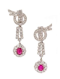 * A Pair of Platinum, Ruby and Diamond Pendant Earclips, 14.90 dwts.