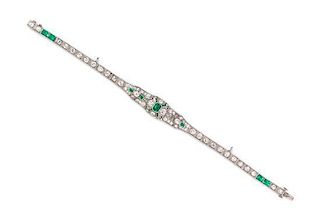 * An Art Deco Platinum, Emerald and Diamond Bracelet, 11.60 dwts.