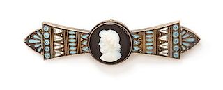 An Etruscan Revival Gilt Silver, Polychrome Enamel and Onyx Cameo Brooch, 8.10 dwts.