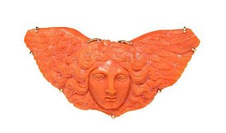 A Victorian Rose Gold and Carved Coral Angel Brooch, 11.60 dwts.