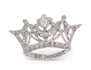 * A 14 Karat White Gold and Diamond Crown Pendant/Brooch, 3.30 dwts.