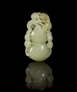 A Carved Pale Celadon Toggle of a Double Gourd, Height 2 1/2 inches.