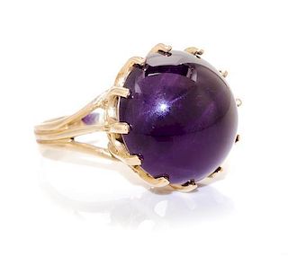 * A 14 Karat Yellow Gold and Amethyst Ring, 8.60 dwts.