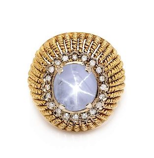 A Bicolor Gold, Star Sapphire and Diamond Bombe Ring, 9.90 dwts.