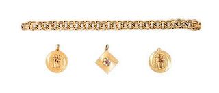 A 14 Karat Yellow Gold Bracelet with Three Unattached Charms, 35.80 dwts.