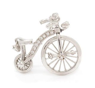 A 14 Karat White Gold and Diamond Articulated Bicycle Brooch, 4.40 dwts.