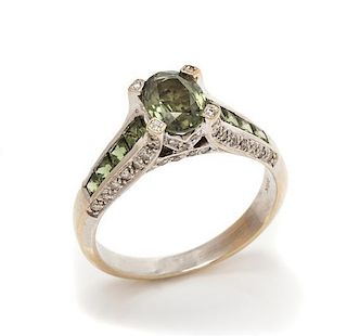 An 18 Karat White Gold, Green Sapphire and Diamond Ring, 2.40 dwts.
