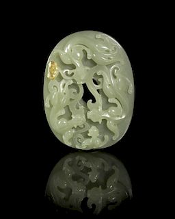 A Carved Celadon Jade Plaque, Width 3 1/8 inches.