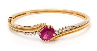 * A 14 Karat Bicolor Gold, Pink Tourmaline and Diamond Bangle Bracelet, 17.60 dwts.